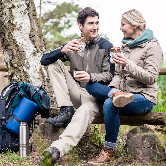 Walker couple outside eating picnic