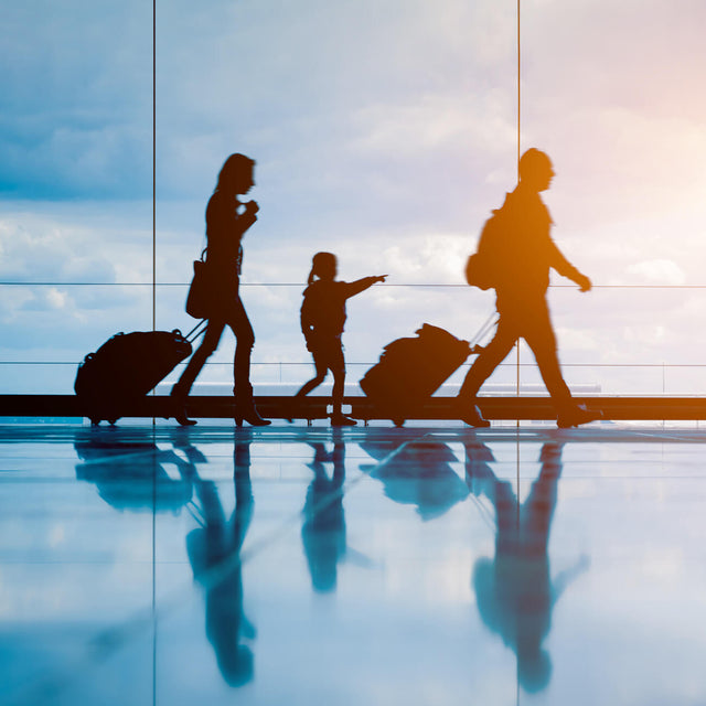 Schelle family travelling in an airport